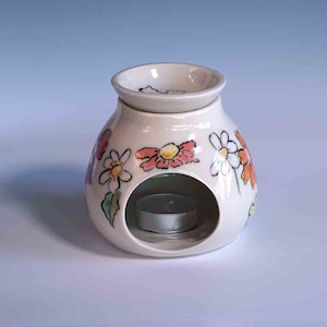 Oil burner diffuser, aromatheraphy , candle burner, Handmade ceramic with spring flowers decoration.