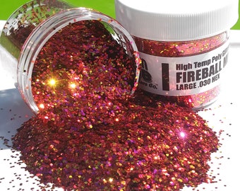 May include: A jar of red and gold glitter labelled "High Temp Poly Glitter Fireball Mix Large .030 Hex".