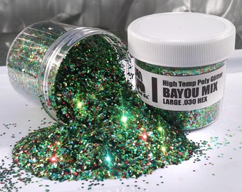 May include: A jar of green, red and gold glitter labelled "High Temp Poly Glitter Bayou Mix Large .030 Hex".