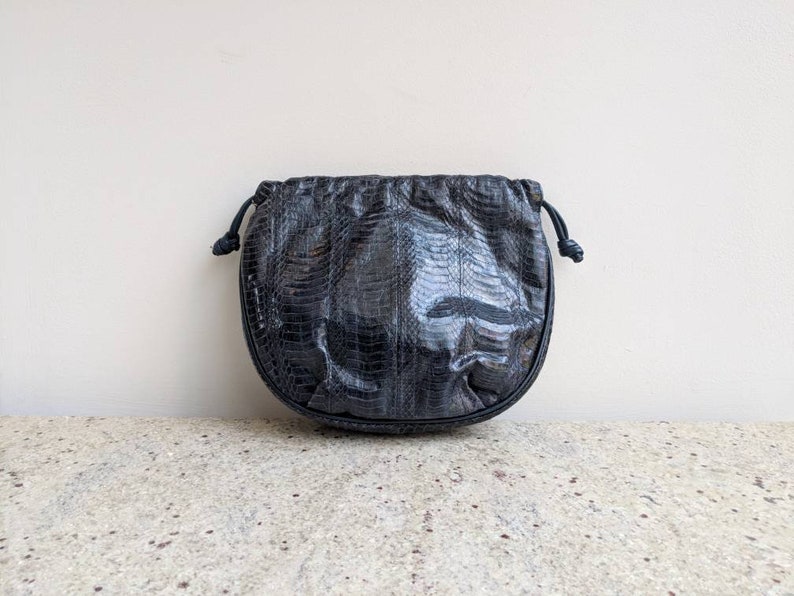 blue snakeskin purse