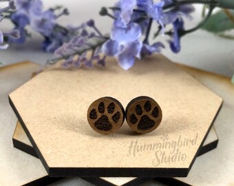 Walnut wood post earrings with small etched Kentucky cat dog bear paw design