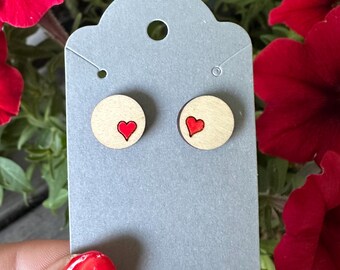 Walnut wood post earrings with small laser engraved heart design hand painted