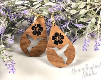 Walnut wood earrings with hummingbird cutout and etched hibiscus flower design