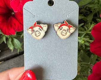 Maple wood post earrings with laser etched pig in a red bandana
