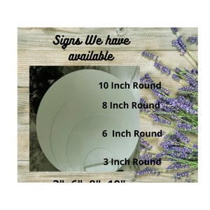 May include: A close-up of four round cake boards in different sizes, 10 inches, 8 inches, 6 inches, and 3 inches in diameter. The boards are white and are arranged in a circle on a wooden surface. The text "Signs We have available" is visible at the top of the image.