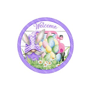May include: A purple gnome with bunny ears and a white polka dot hat is holding a pink truck filled with colorful Easter eggs. The truck has a pink bow on the back. The gnome is standing in front of a white wooden sign with the word "Welcome" written on it. The sign is surrounded by a purple circle with white polka dots.