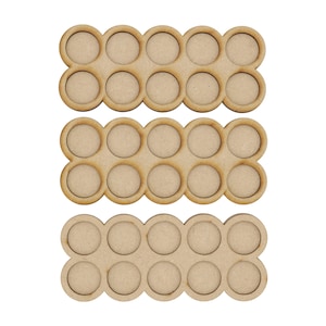 May include: Three wooden trays with 12 circular cutouts each. The trays are stacked on top of each other. The trays are made of light brown wood and have a natural finish.