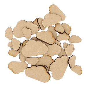 May include: A collection of wooden cloud shapes in various sizes, ideal for crafting projects. The clouds are made from natural wood and have a light brown colour.