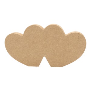 May include: Two unfinished wooden hearts joined together, ideal for crafting and decorating.