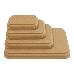 May include: Set of six unfinished wooden square trays, stacked in a pyramid shape. The trays are made of natural wood and have a smooth, sanded finish.