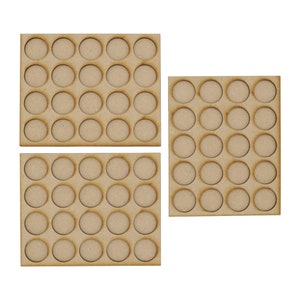 May include: Three wooden paint pot storage trays with circular cutouts. Each tray has 25 circular cutouts for storing paint pots.