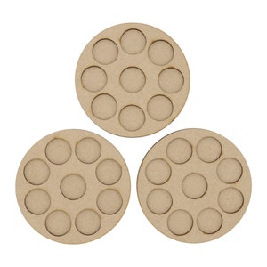 May include: Three round wooden trays with 12 circular cutouts each. The trays are designed to hold small round objects, such as paint pots or other craft supplies.