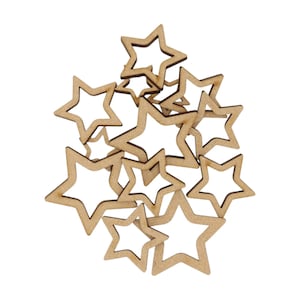 May include: A pile of unfinished wooden star cutouts. These craft stars are light brown and have a five-pointed star shape with a hollow centre. They are scattered on a white background, ideal for DIY projects and decorations.
