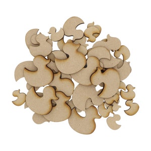 May include: A pile of unfinished wooden duck shapes, ideal for crafting projects. The shapes are light brown and have a natural wood grain.
