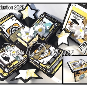 May include: A handmade graduation explosion box in black, white, and gold. The box features multiple layers with decorative elements, including star cutouts, paper flowers, and the text "Graduation 2026." It includes the text "Hawaii Baptist Academy" and "Class of 2026."