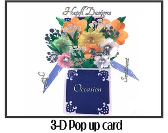 May include: A 3-D pop-up card with a bouquet of flowers in shades of yellow, orange, pink, and green. The card is blue with a white border and the word "Occasion" in white lettering. The card is titled "3-D Pop up card".