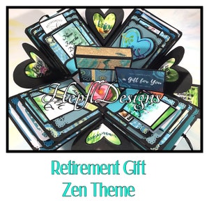 May include: A blue and green explosion box with a zen theme. The box is decorated with hearts, flowers, and inspirational quotes. The box is open and the inside is decorated with a variety of patterns and colors. The box is a retirement gift.