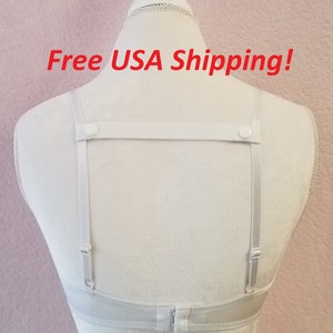 May include: White bra strap converters with adjustable straps and a hook and eye closure. Free USA Shipping!