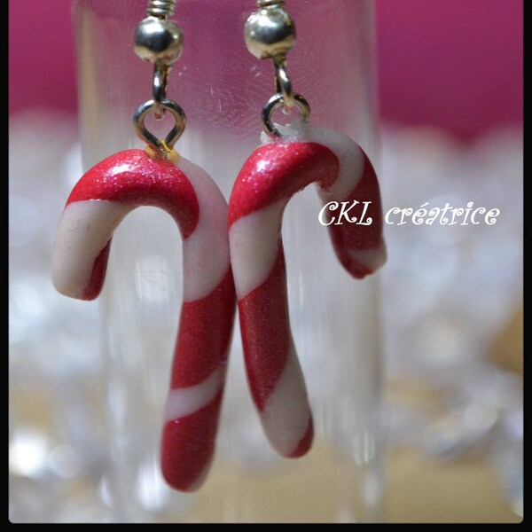 Boucles d'oreilles pendantes fimo forme sucre d'orge rouge pailleté et blanc phosphorescent