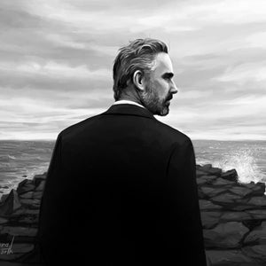 May include: A man in a black suit stands on a rocky shore, looking out at the ocean. The sky is cloudy and the water is choppy.