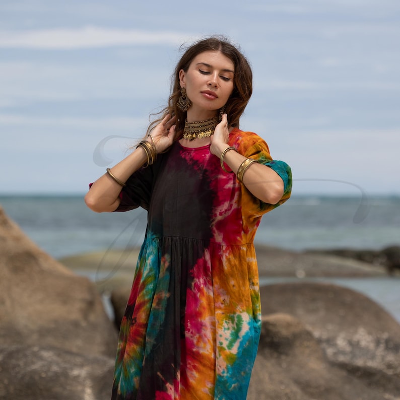 Plus size tie-dye harem romper for bohemian lifestyles, designed in breathable cotton with a one size fit. Perfect for spiritual travelers, music festival lovers, or beach days. Ethically handmade and naturally dyed, this flowy jumpsuit flatters every curve and offers comfort, movement, and soul.