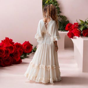 Celebrate your special day in effortless style with the ZinniaPearl Beata boho wedding dress – a timeless design that embraces natural beauty, individuality, and unparalleled comfort for every bride.