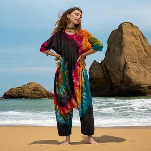 Boho cotton jumpsuit with tie-dye artistry, made for women who dance to their own rhythm. Oversized one-size fit for plus size beauty, with a relaxed cut and artisan details. Great for lounging, layering, or standing out at any summer celebration, from beaches to soul gatherings.