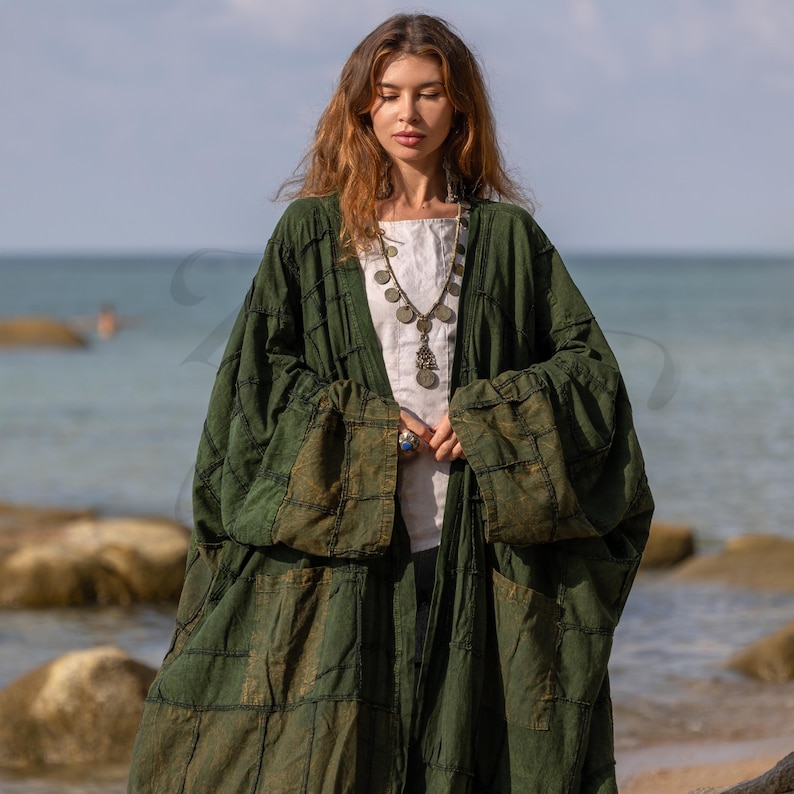 Detailed texture shot of the Firest Green canvas. Focuses on the raw, deconstructed seams and the heavy weave of the cotton. The fabric appears soft yet durable, with a stone-washed matte finish that highlights the high-quality construction.