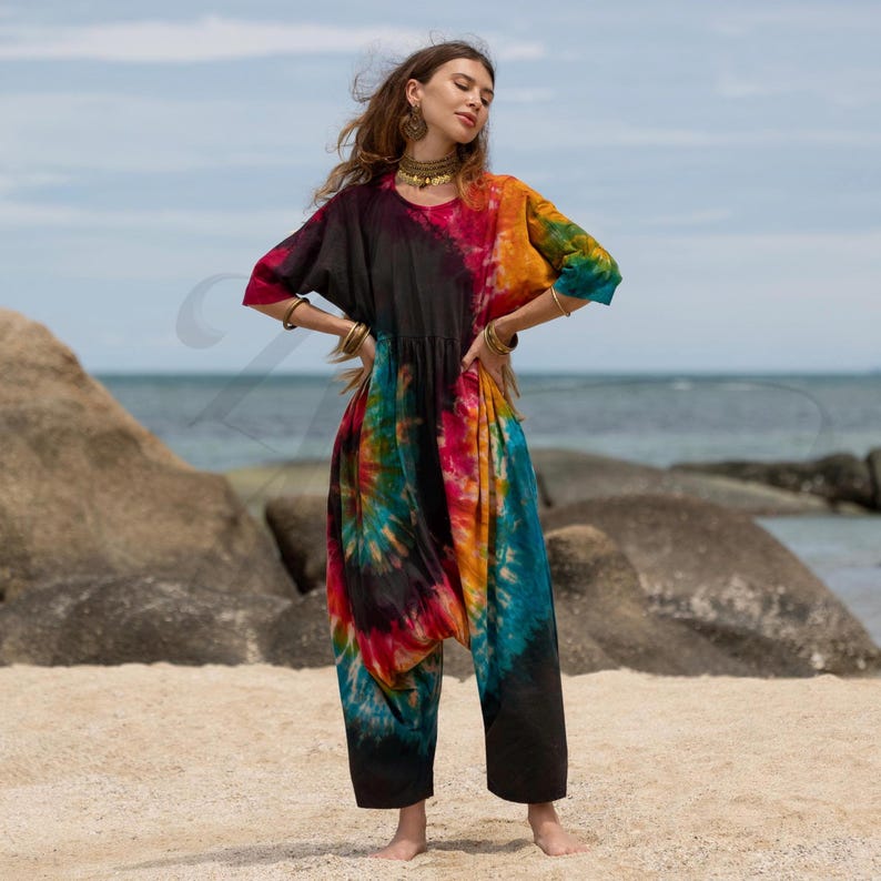 Boho tie-dye cotton jumpsuit for plus size women, handmade festival romper, one size harem jumpsuit, breathable jersey cotton, artisan dyed in vibrant psychedelic colors. Ideal for beach vacations, lounging, gifting, or spiritual retreats. A unique summer outfit for curvy women who love bold, ethical, and artistic fashion made with love.
