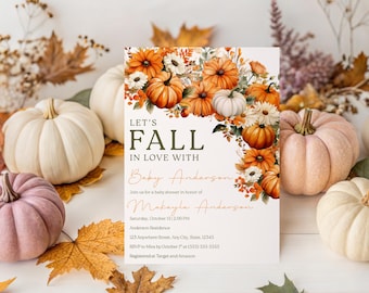 Peut inclure: Une invitation à une baby shower avec le texte "Let's Fall in Love With Baby Anderson", entourée de citrouilles orange et blanches et de feuilles d'automne. L'invitation comprend les détails de l'événement.