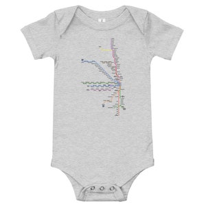May include: A gray baby onesie with a map of the Chicago 'L' train system printed on the front. The map shows the different lines and stations of the Chicago Transit Authority.