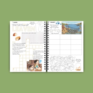May include: Open spiral-bound activity book with colorful illustrations and text. The left page features a crossword puzzle with the word "LEAVEN" and bread illustrations. The right page shows a fishing scene and a fish-counting activity. The book is on a green background.