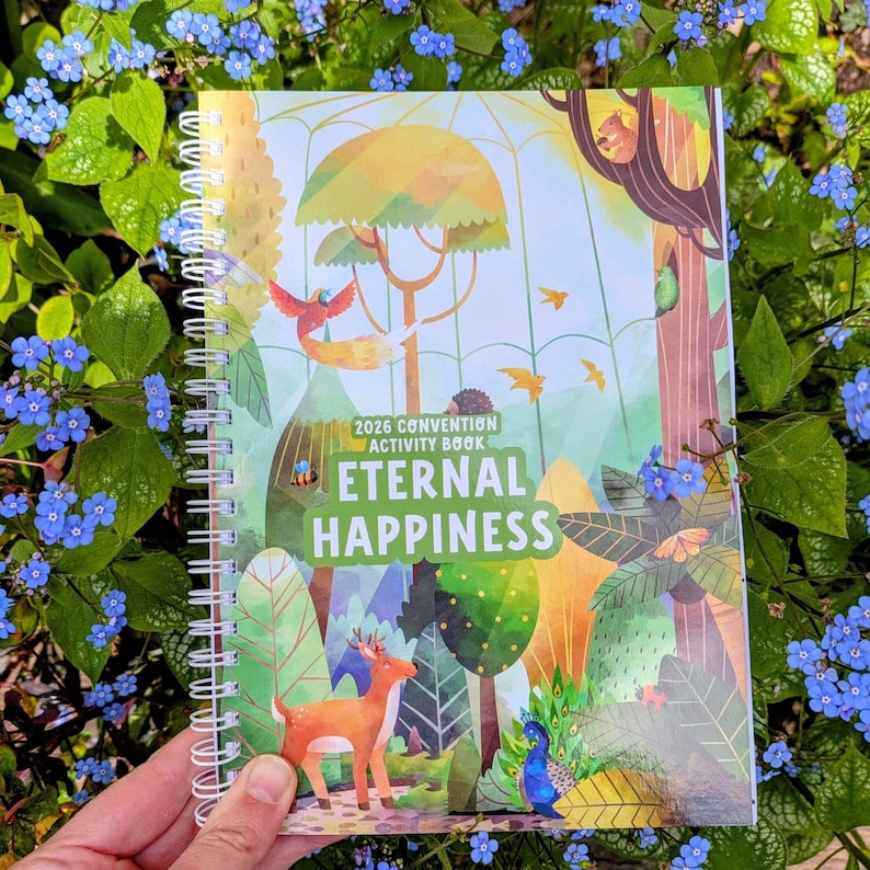 May include: A spiral-bound activity book with a colorful illustration of a forest scene. The cover features the text "2026 Convention Activity Book" and "Eternal Happiness". The artwork includes a deer, peacock, birds, and trees.