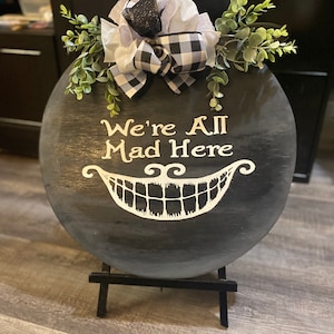 We’re All Mad Here - door hanger