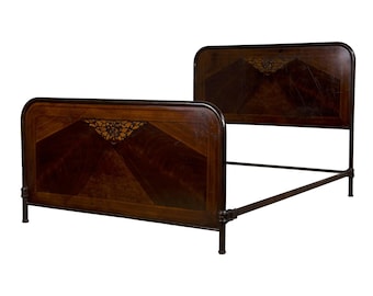 May include: A dark brown wooden bed frame with a geometric design. The frame is made of metal and has a curved headboard and footboard.