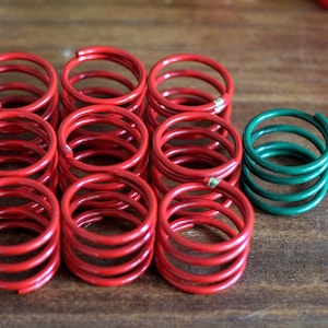 Red Wire Napkin Rings, Set of Nine + One Green
