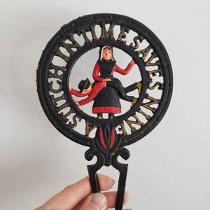Winton Cast Iron Trivet "Stitch in Time Saves Nine"