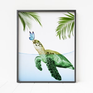 May include: A green sea turtle swims in blue water with a blue butterfly near its head. Palm leaves are in the background.