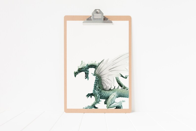 May include: A green dragon with white wings is depicted on a white background. The dragon is in a standing position with its wings spread out. The dragon has a long tail and sharp claws.