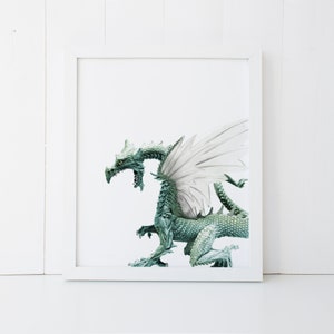 May include: A green dragon with white wings, standing on a white background.