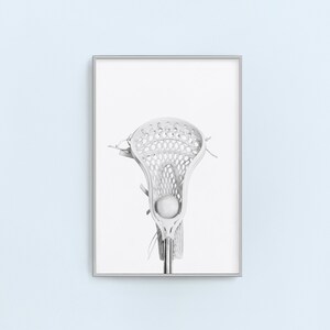 K&ouml;nnte beinhalten: Ein wei&szlig;er Lacrosse-Schl&auml;ger mit einem wei&szlig;en Ball im Netz. Der Schl&auml;ger ist vor einem wei&szlig;en Hintergrund isoliert.