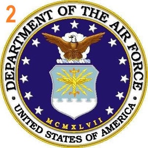May include: A blue and gold seal with the words "Department of the Air Force, United States of America" and a bald eagle with outstretched wings. The seal also includes a shield with a lightning bolt design and the year "MCMXLVII".