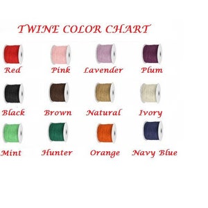 May include: A color chart showing different colors of twine. The colors are red, pink, lavender, plum, black, brown, natural, ivory, mint, hunter, orange, and navy blue.