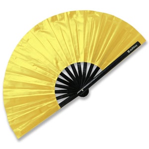 May include: A bright yellow hand fan with a black wooden handle and ribs. The fan's fabric has a shiny, pleated texture. The brand name "daftboy" is printed in white on the handle. This fan is ideal for dance, cosplay, or as a decorative accessory.
