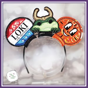 May include: A pair of Mickey Mouse ears with three different character designs. The left ear features a red, white, and blue button with the text "Loki for President". The right ear features a green, orange, and yellow character with a large smile. The headband is black.