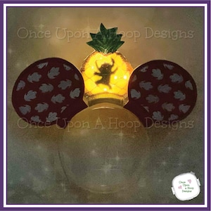 May include: Light-up Minnie Mouse ears with a pineapple design featuring a silhouette of a character inside. The ears are red with a white pattern and the pineapple is yellow with green leaves.