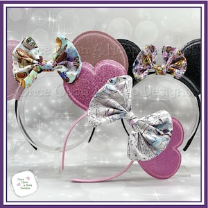 May include: Several headbands with decorative bows and heart-shaped accents. The bows feature colorful patterns, including coffee cups and cartoon characters. The headbands are black, pink, and clear, with glittery heart shapes.