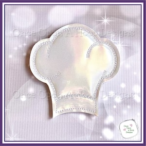 May include: A white iridescent chef's hat with a sparkly border. The hat is a digital embroidery design.