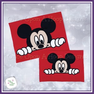 May include: Two red fabric patches with embroidered images of Mickey Mouse peeking over the top. The larger patch has the text "Once Upon A Hoop Designs" above the image. The smaller patch has the same text below the image.