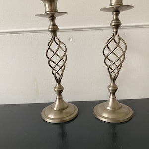Pair of vintage metal candleholders